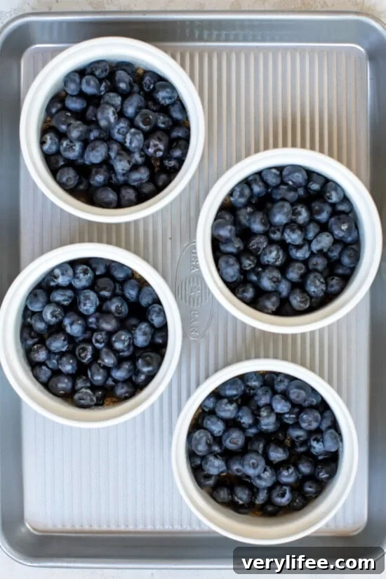 Blueberry Upside Down Cake Recipe with Lemon Glaze 6 Blueberries in ramekins