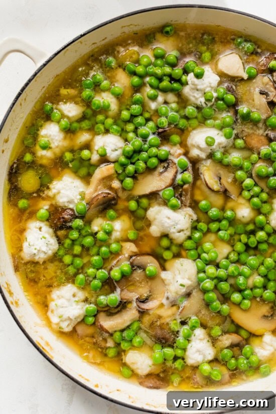 Add peas to the chicken