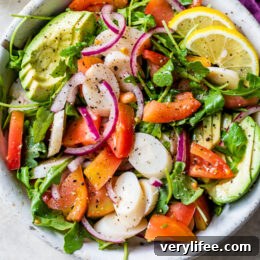 Protein-Packed Vegan Quinoa Bowl with Roasted Veggies and Tahini 10 Lemony Hearts of Palm and Avocado Salad