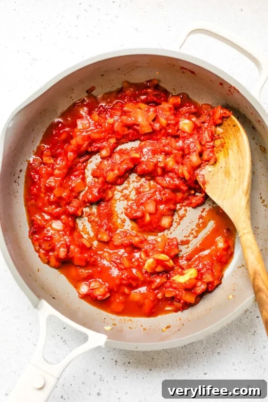 Creamy Cottage Cheese Pasta Recipe 7 saute onion and tomato paste