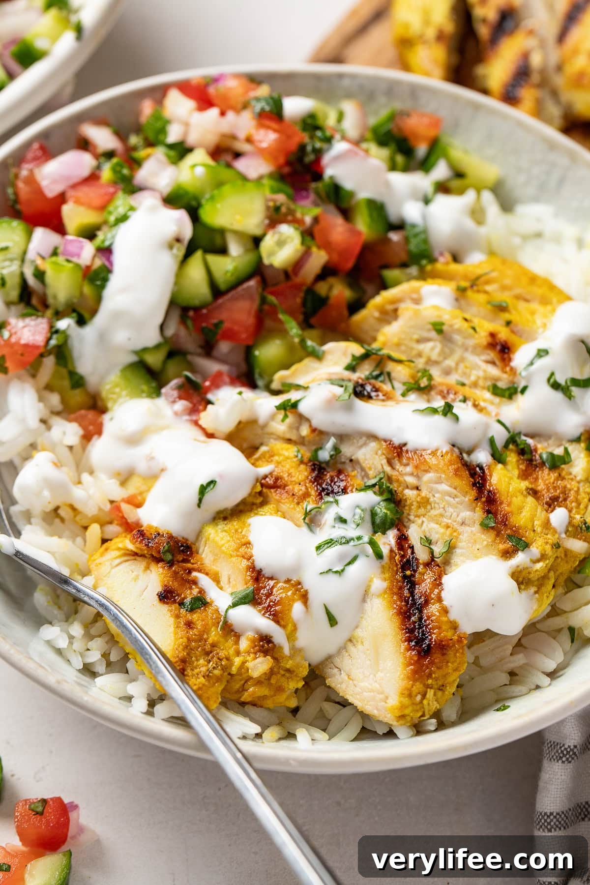 Mediterranean Feta-Brined Chicken Bowl with Shirazi Salad 12 Feta Brined Chicken Bowls with Shirazi Salad