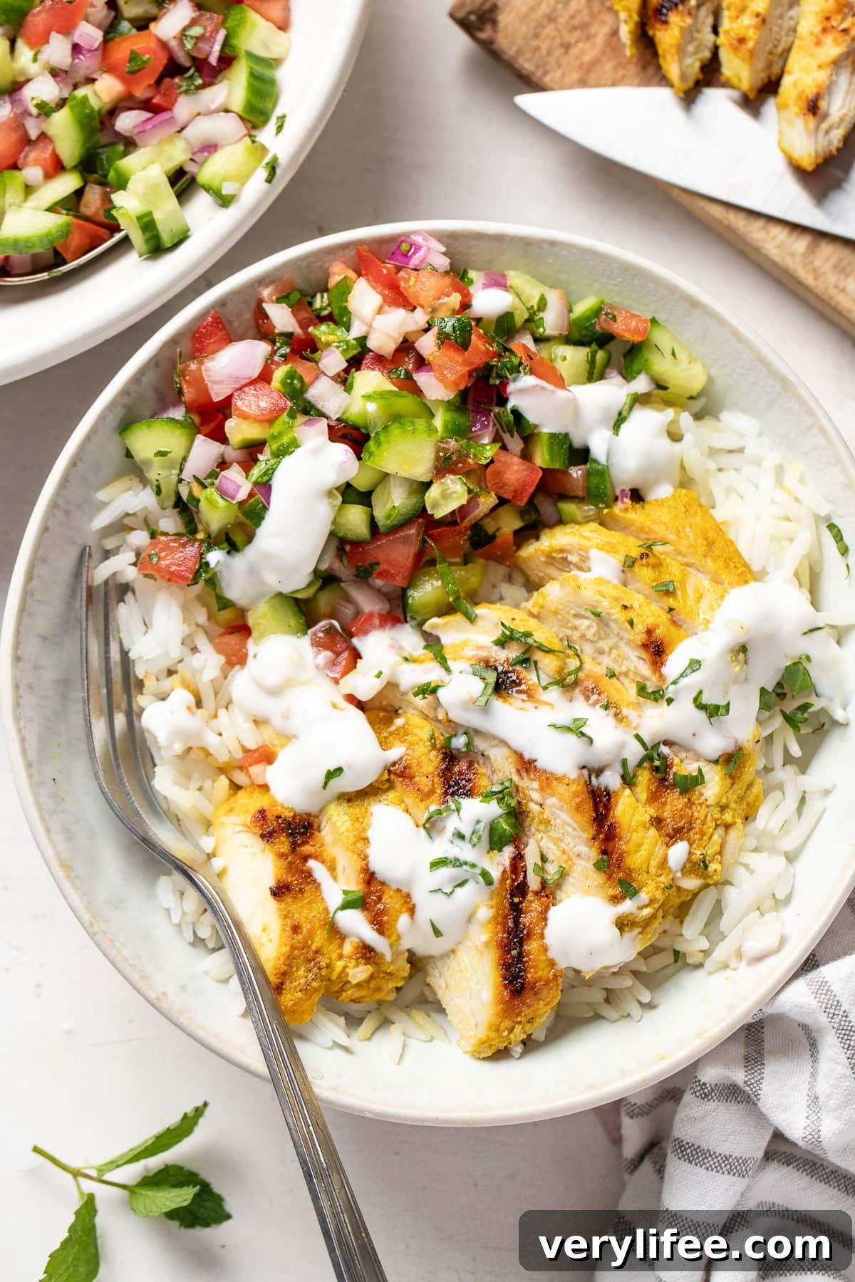 Mediterranean Feta-Brined Chicken Bowl with Shirazi Salad 13 Feta Brined Chicken Bowls with Shirazi Salad
