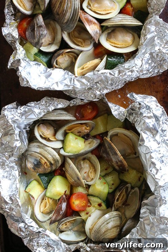 14 Flavor-Packed Foil Packet Recipes for Camping and Grilling 18 Grilled Clams in Foil