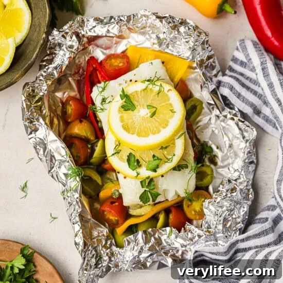 14 Flavor-Packed Foil Packet Recipes for Camping and Grilling 8 Mediterranean Fish in Foil with lemon