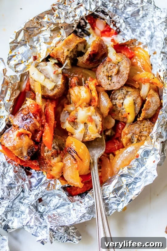 14 Flavor-Packed Foil Packet Recipes for Camping and Grilling 9 Foil Packet Cheesy Sausage and Peppers