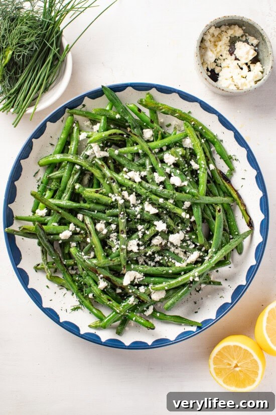 Smoky Grilled Green Bean Salad with Lemon Vinaigrette 8 top green beans with fresh herbs and feta