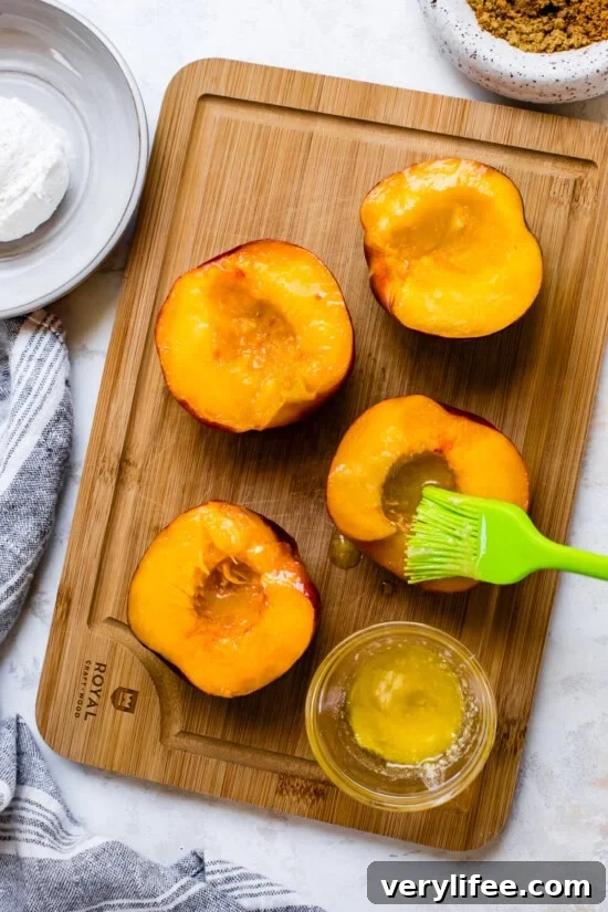 Brush peaches with melted butter