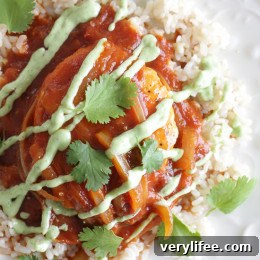 A quick Mexican-inspired chicken dish, made in the skillet with a smoky-spicy tomato-chipotle sauce topped with an avocado-sour cream sauce.