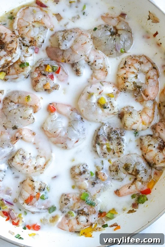 Creamy Jamaican Coconut Shrimp Stew Recipe 2 Jamaican Coconut Shrimp Stew, a quick, light and spicy shrimp dish simmered in coconut milk, inspired by my trip to Ochos Rios, Jamaica.
