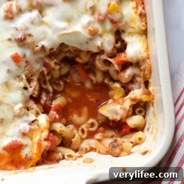 Chicken sausage, bell peppers, onions and mushrooms simmered in a marinara sauce then baked in the casserole with whole wheat macaroni topped with mozzarella.
