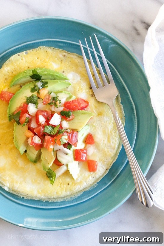Open-Faced Omelet with Avocado and Pico de Gallo – an easy breakfast omelet recipe ready in under 5 minutes! Weight Watchers Smart Points: 3 Calories: 140