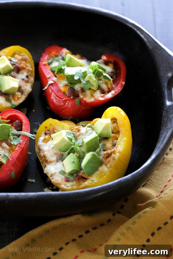 Chicken Taco Chili Stuffed Peppers Bell peppers stuffed with Crock Pot Chicken Taco Chili and topped with melted cheddar cheese