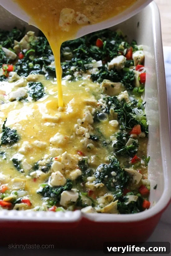 Eggs, spinach, artichokes and Feta cheese – a healthy breakfast casserole, perfect to feed a crowd or to make ahead for meal prep to heat up for the week.