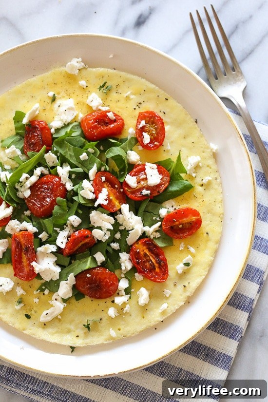 Open-Faced Omelet with Feta, Roasted Tomatoes and Spinach Open-Faced Omelet with Feta, Roasted Tomatoes and Spinach