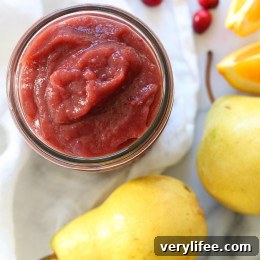 Sweet Autumn pears compliment tart cranberries in this wonderful cranberry pear butter spread, perfect for Thanksgiving, Friendsgiving or anytime you want to add a little sweet-tartness to your meal.