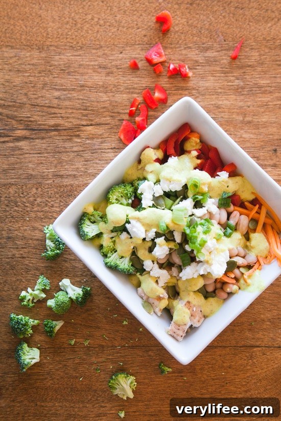 Seattle Sunshine Bowl Seattle Sunshine Bowl – quinoa, grilled chicken, white beans, chopped veggies, pumpkin seeds, feta, and scallions, topped with Sunshine Sauce.