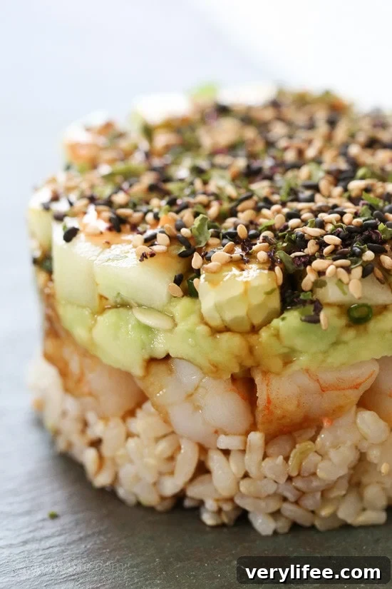 Spicy California Shrimp Stack Spicy California Shrimp Stack — layers of brown rice, cucumber, avocado and shrimp topped with spicy mayo