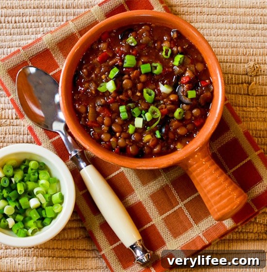 Vegan Lentil Chili with Roasted Red Peppers, Olives and Green Onion