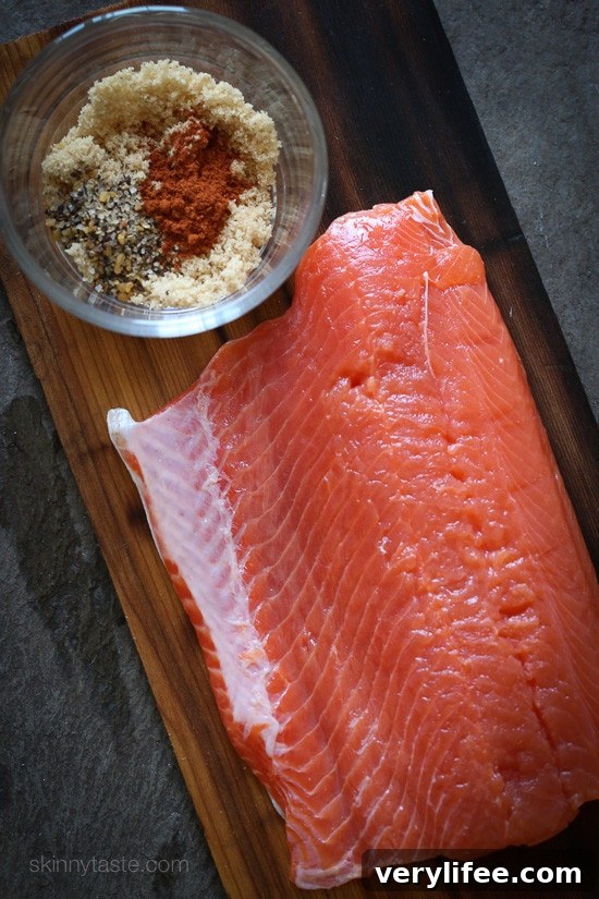 Cedar Plank Spice-Rubbed Salmon Cedar plank with salmon topped with brown sugar and spices