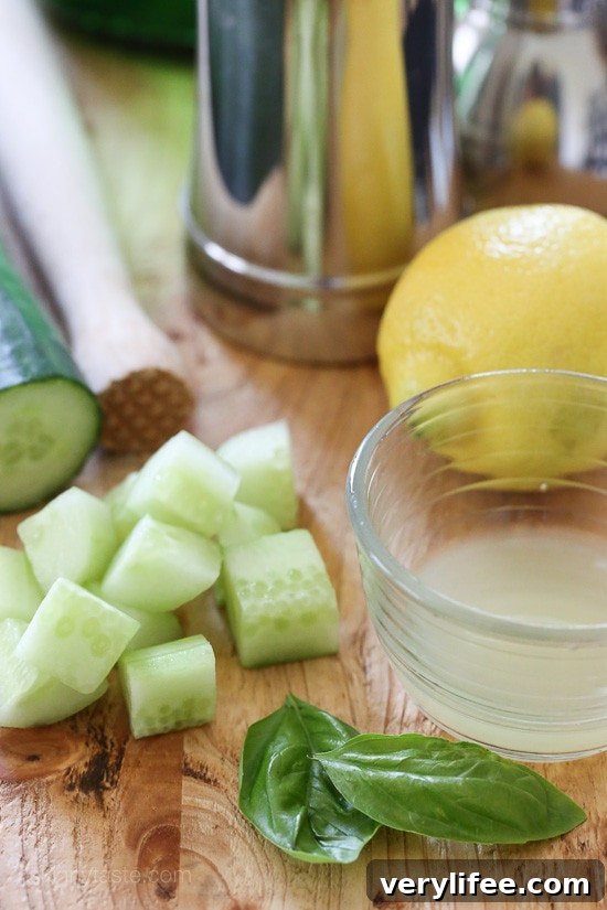 Basil Cucumber Gin Cocktail Recipe 4 Ingredients spread: cucumber, lemon, basil and shaker