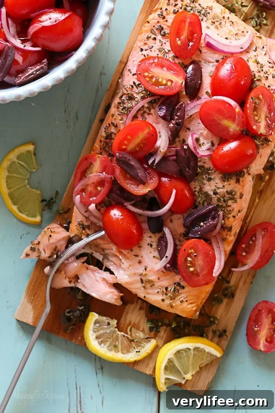 Grilled Mediterranean Cedar Plank Salmon Grilled wild Mediterranean cedar plank salmon topped with tomatoes, kalamata olives and red onion.