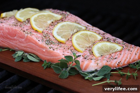 Grilled Mediterranean Salmon on Cedar Plank 2 Grilled wild Mediterranean cedar plank salmon topped with tomatoes, kalamata olives and red onion.