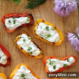 These mini peppers are grilled until slightly charred and filled with an herb cream cheese. A great appetizer to make for the summer!