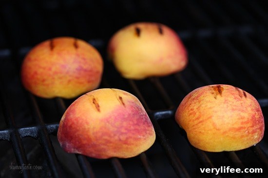 Grilled peaches on a plate