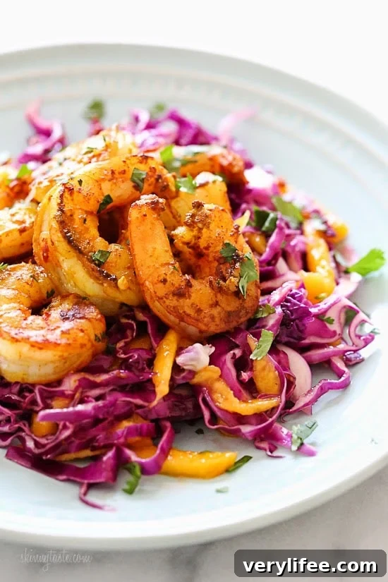 Turmeric-Garlic Shrimp with Cabbage-Mango Slaw Turmeric Shrimp with mango and cabbage slaw