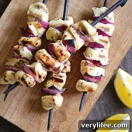 Grilled lemon Dijon chicken skewers on plate
