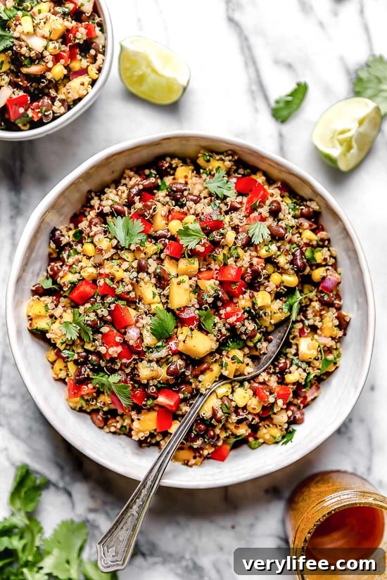 This healthy Southwestern Black Bean, Quinoa and Mango Salad is delicious, a great way to get more vegetables and plant-based foods to your diet.