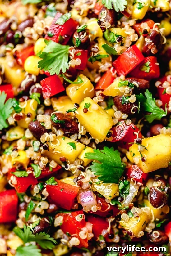 This healthy Southwestern Black Bean, Quinoa and Mango Salad is delicious, a great way to get more vegetables and plant-based foods to your diet.