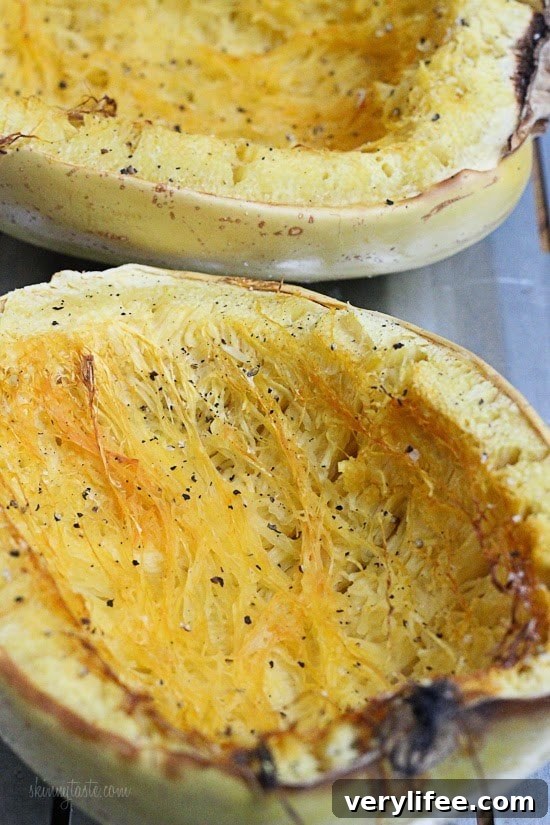 Spaghetti Squash Nests with Baked Eggs Recipe 2 Two roasted halves of spaghetti squash