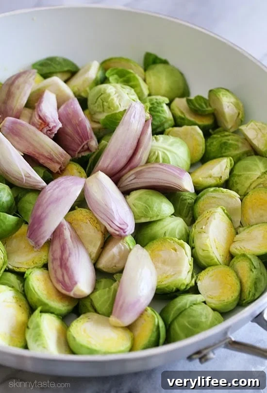 Closeup of roasted brussels sprouts and shallots with glaze