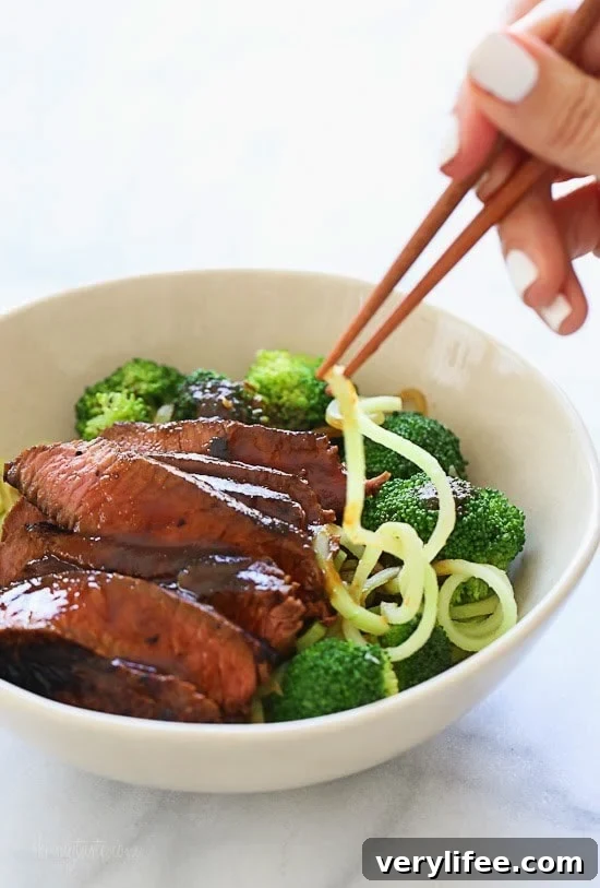 Marinated sirloin steak with broccoli and spiralized broccoli noodles in a delicious hoisin sauce.
