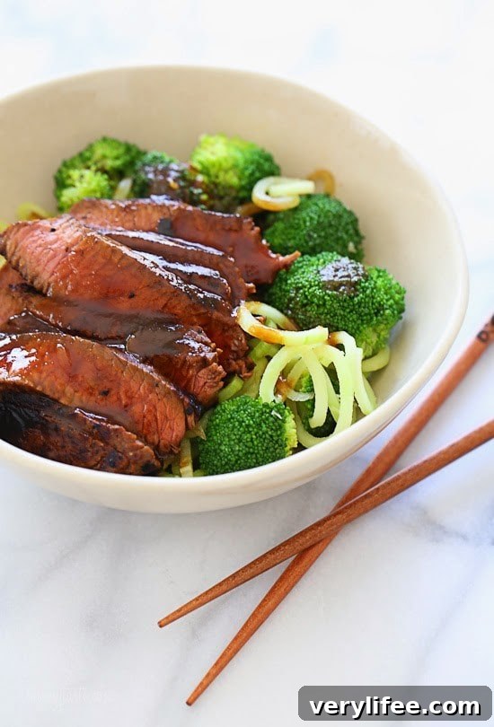 Marinated sirloin steak with broccoli and spiralized broccoli noodles in a delicious hoisin sauce.