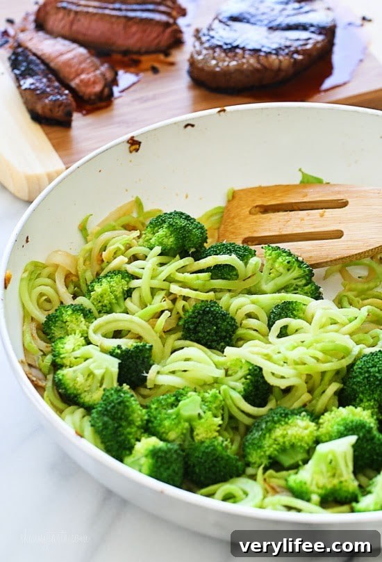 Marinated sirloin steak with broccoli and spiralized broccoli noodles in a delicious hoisin sauce.