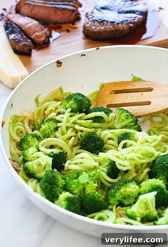 Marinated sirloin steak with broccoli and spiralized broccoli noodles in a delicious hoisin sauce.