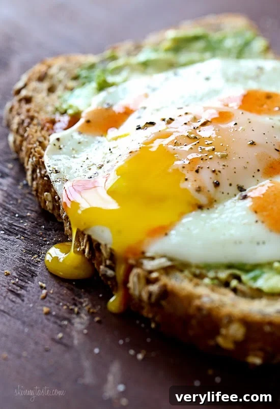 4 Ways to Make Avocado Toast with Egg 12 Avocado Toast with a runny egg