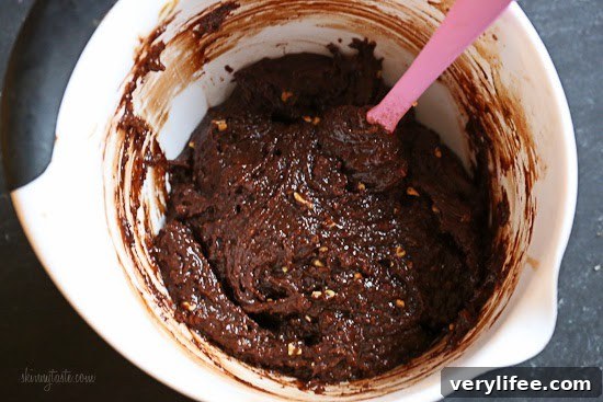 These cookies are amazing!!! And so easy to make,  you don't even need a mixer! Only 5 ingredients including Nutella, Chunky Almond Butter and Cocoa Powder.