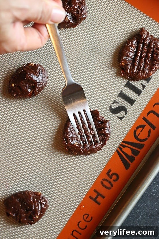 These cookies are amazing!!! And so easy to make,  you don't even need a mixer! Only 5 ingredients including Nutella, Chunky Almond Butter and Cocoa Powder.