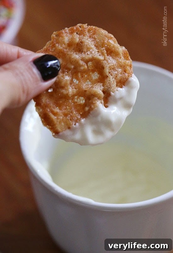 Crispy White Chocolate Oatmeal Lace Cookies Recipe 3 Cookies on a rack