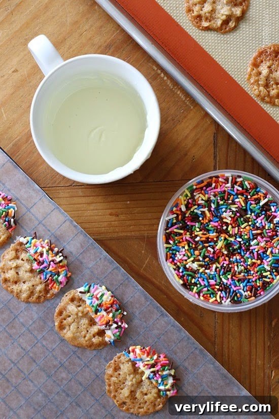 Crispy White Chocolate Oatmeal Lace Cookies Recipe 5 White chocolate dipped cookies with sprinkles