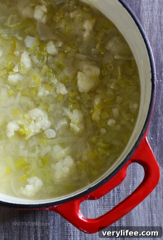 Creamy Cauliflower and Leek Soup Recipe 7 Bowl of creamy cauliflower leek soup with garnish