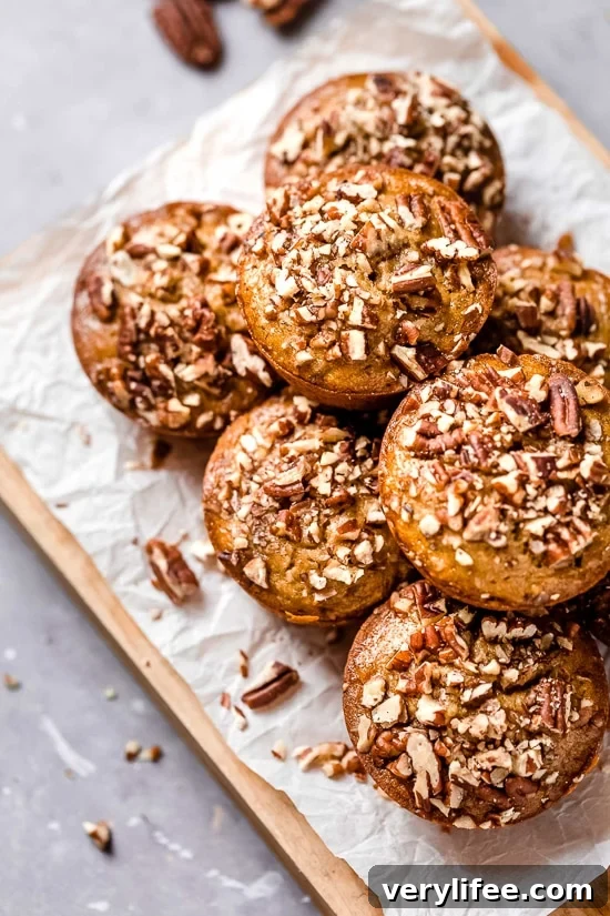Moist and delicious Maple Pecan Banana Muffins, so good you won't believe they are light!