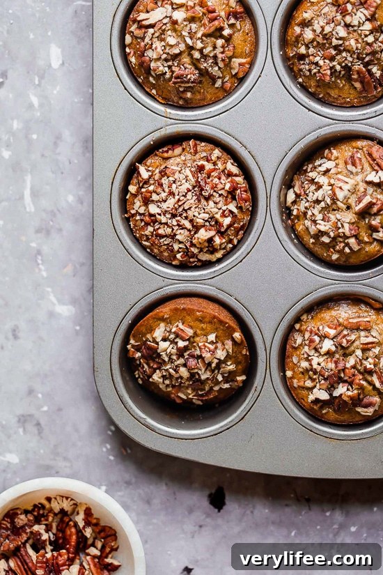 Moist and delicious Maple Pecan Banana Muffins, so good you won't believe they are light!