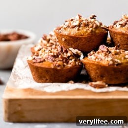 Moist and delicious Maple Pecan Banana Muffins, so good you won't believe they are light!
