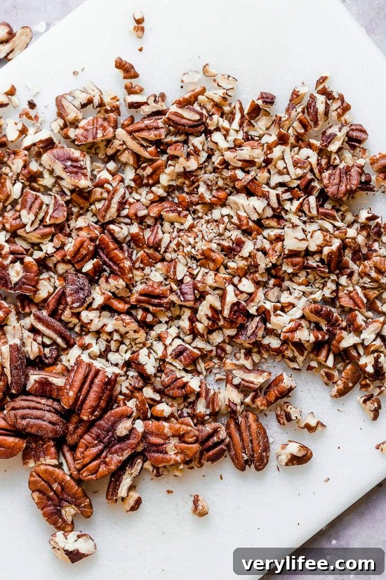 Moist and delicious Maple Pecan Banana Muffins, so good you won't believe they are light!