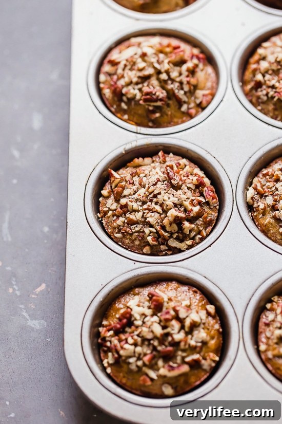 Moist and delicious Maple Pecan Banana Muffins, so good you won't believe they are light!