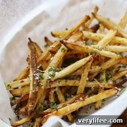These delicious fries are baked with garlic and finished with parmesan